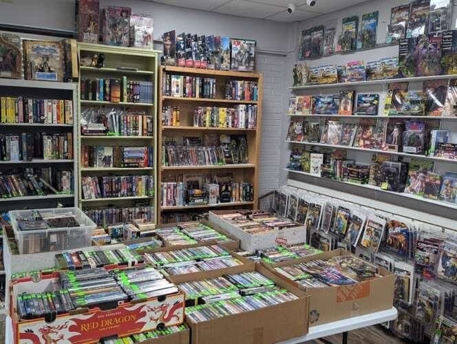 Buried under comics and toys comic book store in Wilmington, North Carolina