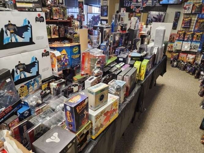 Comic book store in Aurora Monkey Paw Toys